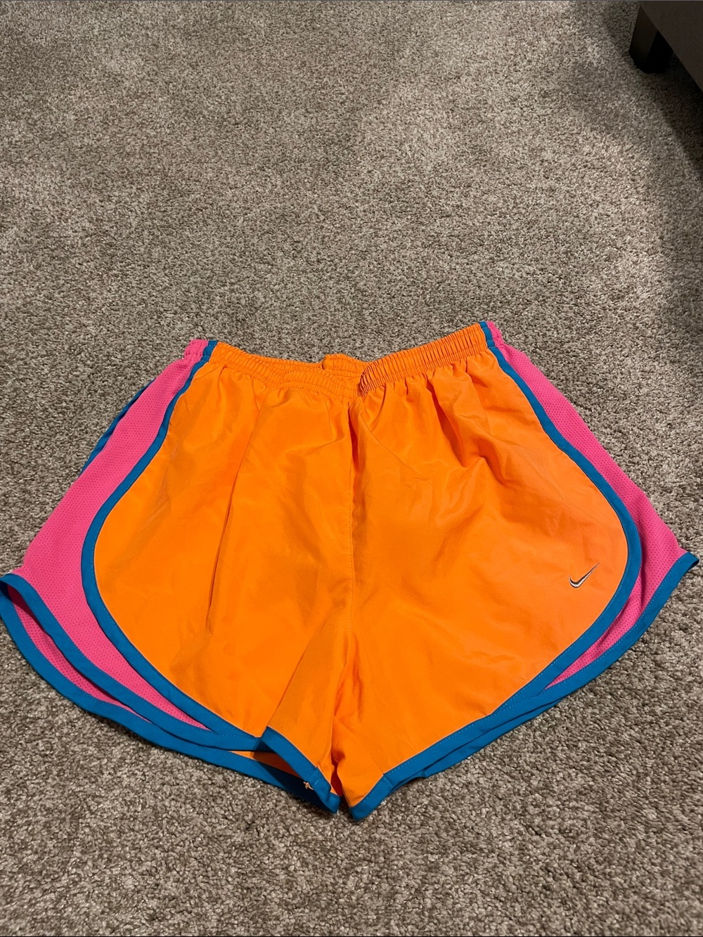 Nike Women's Bright Orange Athletic Shorts with Pink and Blue Trim